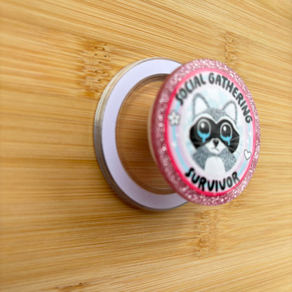 Social Gathering Survivor Raccoon Magnetic Grip | Kindle & Phone Holder, Compatible With MagSafe Devices